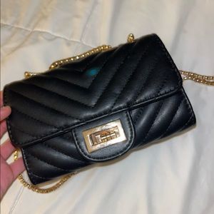 Black And gold clutch
